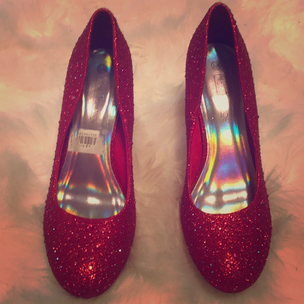 Ruby Red 3 inch heels . Tag still on it .